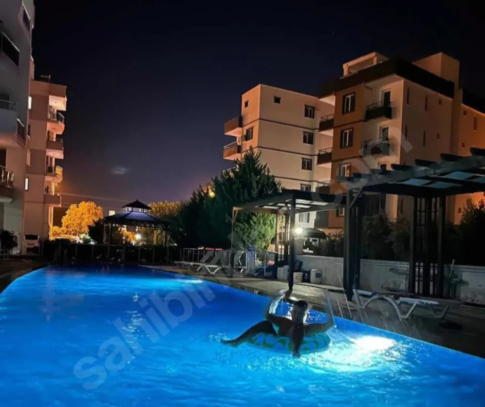 Silifke Tasucu'nda mersin-antalya yoluna yakin satilik ESYALII 2+1 daire